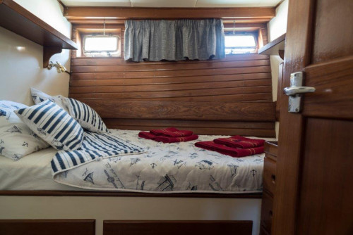 Luxury private boat tour in Opatija – guests on board a spacious motor yacht