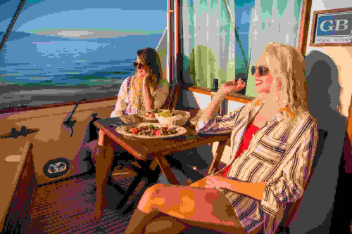 Luxury private boat tour in Opatija – guests on board a spacious motor yacht